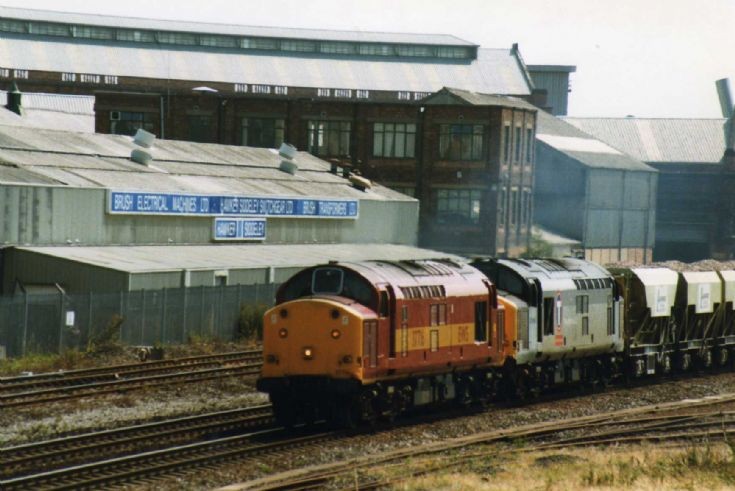 Two diesel locs in tandem pulling freight
